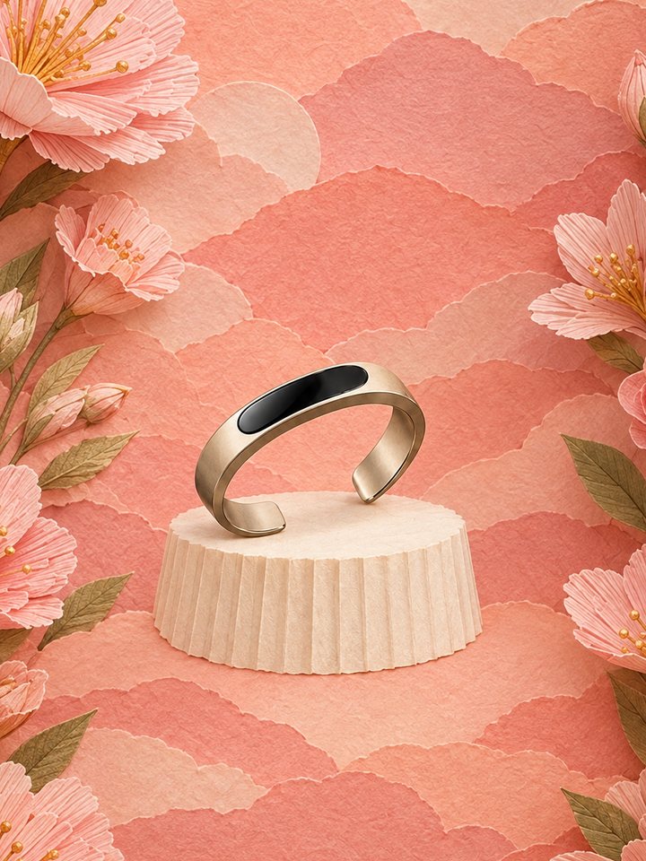 Le Pinson in champagne titanium within a dawn niche of blush paper clouds