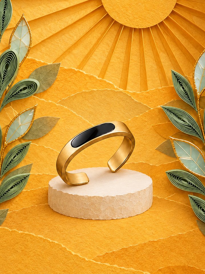 Le Pinson in sun-gilded titanium within a saffron niche under a paper sun
